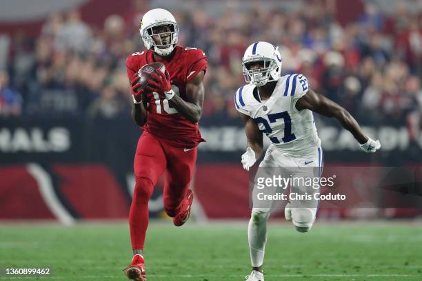 Green of the Arizona Cardinals catches a pass against Xavier Rhodes of the Indianapolis Colts during the fourth quarter at State Farm Stadium on...