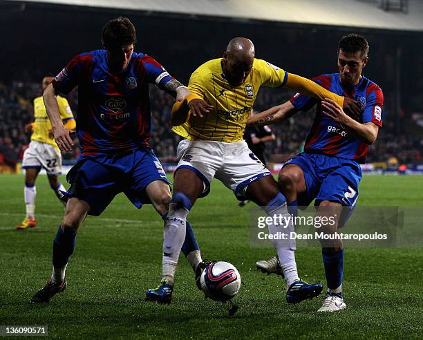 Paddy McCarthy and darren Ambrose of Palace and Marlon King of Birmingham battle for the ball during the npower Championship match between Crystal...