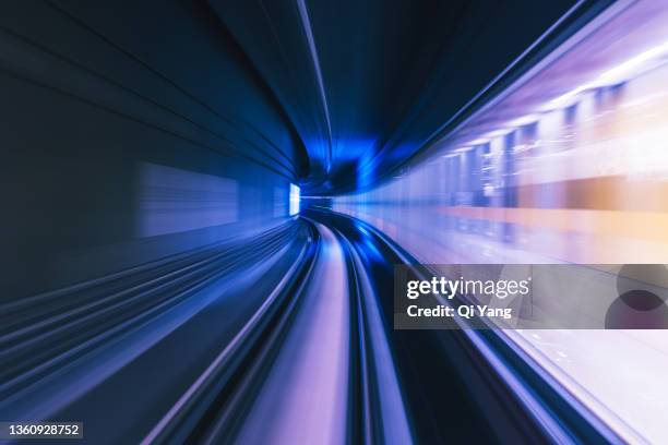 long exposure of subway tunnel - bahntunnel stock-fotos und bilder