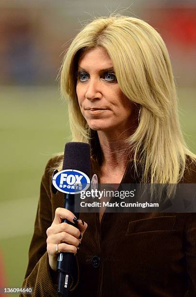 Sports sideline reporter Laura Okmin looks on during the game between the Minnesota Vikings and the Detroit Lions at Ford Field on December 11, 2011...