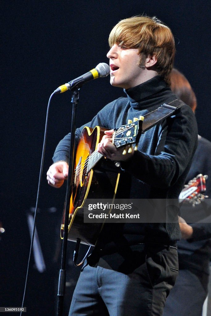 Adam Hastings Of The Bootleg Beatles Performs On Stage At HMV News adam-hastings-of-the-bootleg-beatles-performs-on-stage-at-hmv-news