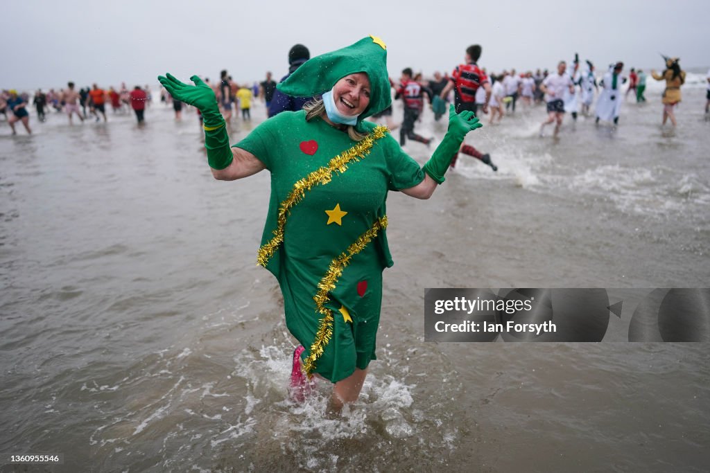 People Take To The Water For Redcar Boxing Day Dip