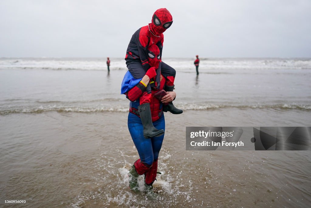 People Take To The Water For Redcar Boxing Day Dip