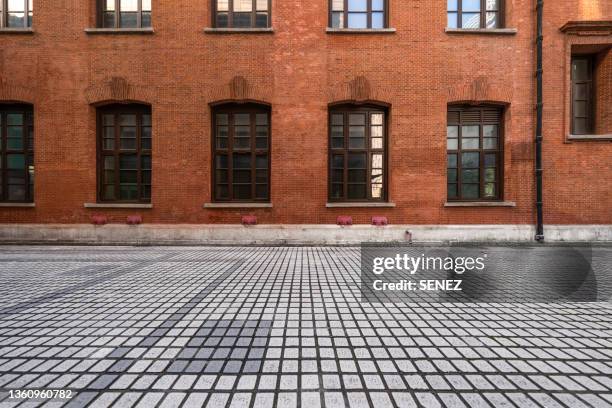 empty parking lot - brick wall close up stock pictures, royalty-free photos & images