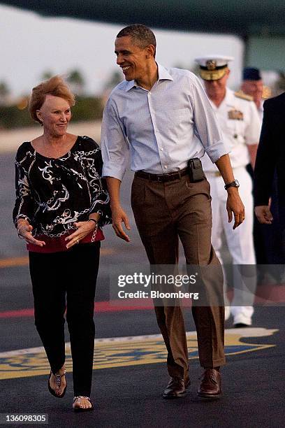 President Barack Obama arrives at Joint Base Pearl Harbor-Hickam in Honolulu, Hawaii, U.S., on Friday, Dec. 23, 2011. Congressional Democrats are...