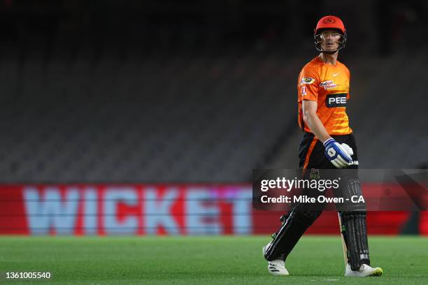 Cameron Bancroft of the Scorchers looks dejected while leaving the field of play after being dismissed by Nic Maddinson of the Renegades during the...