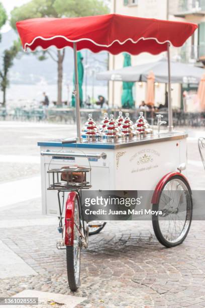ice cream cart in menaggio. lake como, italy, lombardia, europe, - market stall stock pictures, royalty-free photos & images