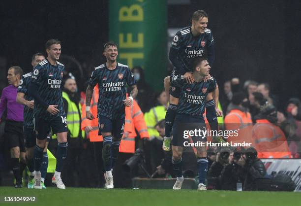 Kieran Tierney celebrates with teammate Martin Odegaard of Arsenal after scoring their team's second goal during the Premier League match between...