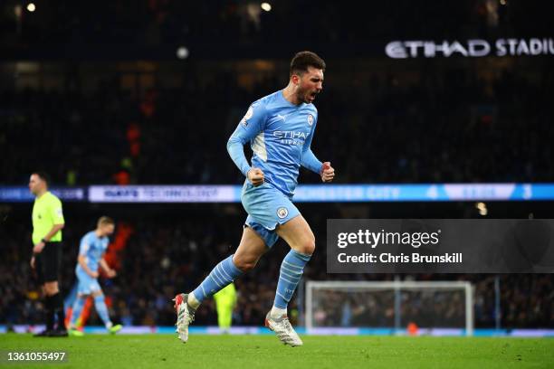 Aymeric Laporte of Manchester City celebrates after scoring their side's fifth goal during the Premier League match between Manchester City and...