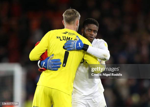 Joe Lumley of Middlesbrough embraces Brice Samba of Nottingham Forest after the Sky Bet Championship match between Middlesbrough and Nottingham...