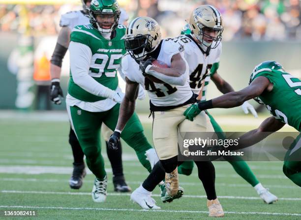 Alvin Kamara of the New Orleans Saints in action against the New York Jets at MetLife Stadium on December 12, 2021 in East Rutherford, New Jersey....