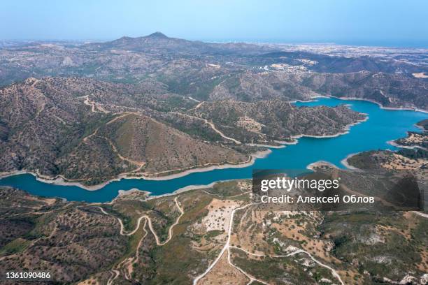 aerial view of dipotamos reservoir. artificial lake in cyprus - larnaca stock pictures, royalty-free photos & images