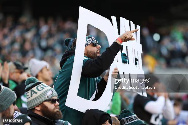 Philadelphia Eagles fan holds a defense sign in the stands during the game against the New York Giants at Lincoln Financial Field on December 26,...