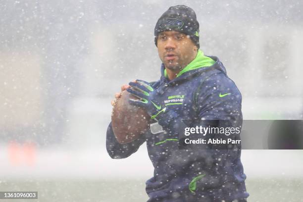 Russell Wilson of the Seattle Seahawks throws the ball during warm-ups before the game against the Chicago Bears at Lumen Field on December 26, 2021...