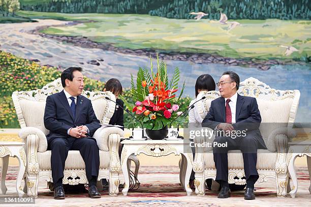 Japan's Prime Minister Yoshihiko Noda attends a meeting with China's National People's Congress Chairman, Wu Bangguo at the Great Hall of the People...