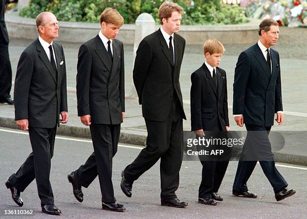 The Duke of Edinburgh, Prince William, Earl Spencer, Prince Harry and Prince Charles walk outside Westminster Abbey during the funeral service for...