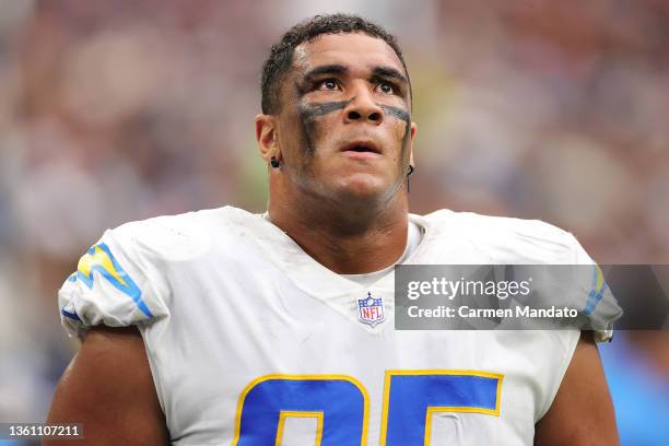 Christian Covington of the Los Angeles Chargers looks on during the fourth quarter against the Houston Texans at NRG Stadium on December 26, 2021 in...