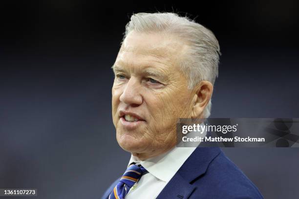 President of football operations John Elway of the Denver Broncos looks on during pre-game before the game against the Las Vegas Raiders at Allegiant...