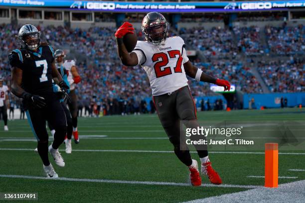 Ronald Jones of the Tampa Bay Buccaneers runs the ball for a touchdown during the third quarter in the game against the Carolina Panthers at Bank of...