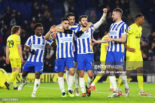 Neal Maupay of Brighton & Hove Albion celebrates with teammates Jakub Moder, Adam Lallana and Adam Webster after scoring their team's second goal...