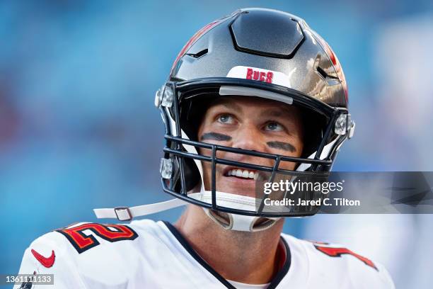 Tom Brady of the Tampa Bay Buccaneers on the sidelines during the fourth quarter gacp at Bank of America Stadium on December 26, 2021 in Charlotte,...