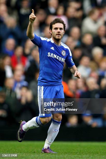 Juan Mata of Chelsea celebrates after scoring the opening goal during the Barclays Premier League match between Chelsea and Fulham at Stamford Bridge...
