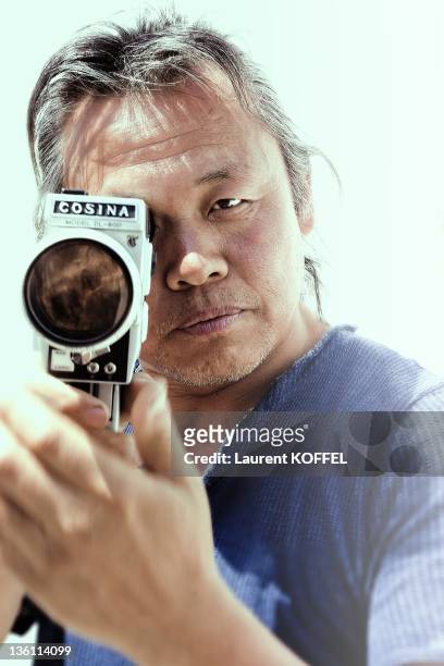 Kim Ki-Duk portrait session, Director of the "Arirang" film, he obtains the award "Un Certain Regard" during the 64th Annual Cannes Film Festival on...