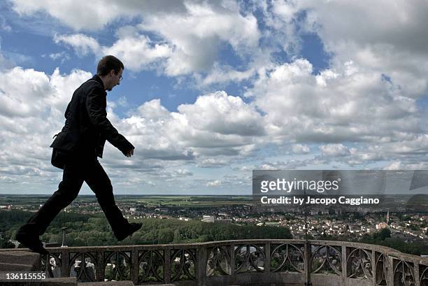 man walking on top - jacopo caggiano stock pictures, royalty-free photos & images