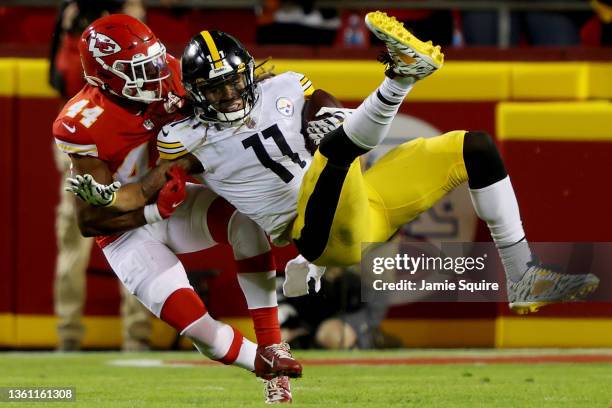 Chase Claypool of the Pittsburgh Steelers is tackled by Dorian O'Daniel of the Kansas City Chiefs during the fourth quarter at Arrowhead Stadium on...