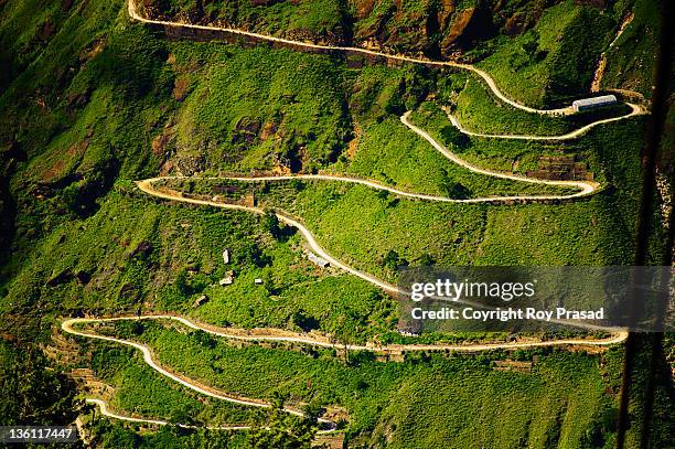 long and winding road - india aerial stock pictures, royalty-free photos & images