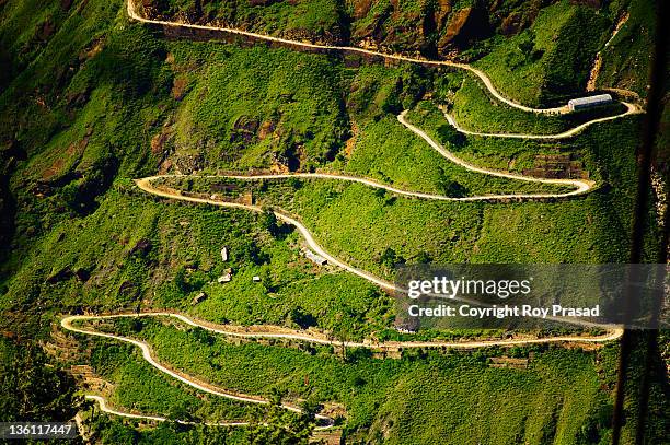 long and winding road - zigzag stock pictures, royalty-free photos & images