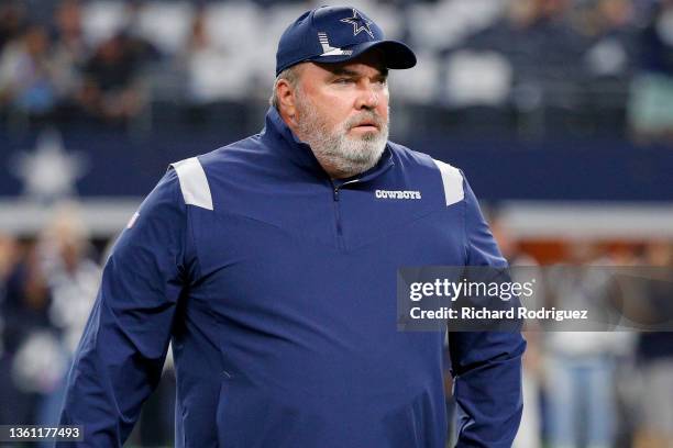 Head coach Mike McCarthy of the Dallas Cowboys looks on during pregame warm-ups prior to a game against the Washington Football Team at AT&T Stadium...