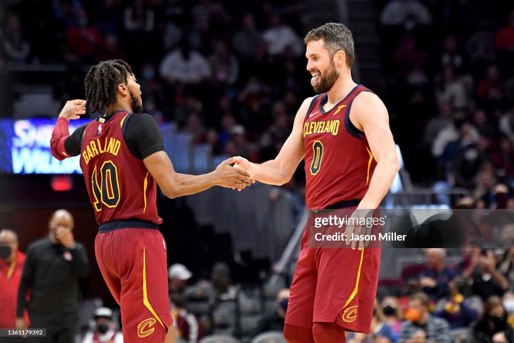 Darius Garland celebrates with Kevin Love of the Cleveland