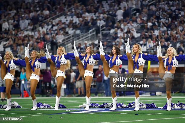 Dallas Cowboys Cheerleaders perform during the game between the Washington Football Team and Dallas Cowboys at AT&T Stadium on December 26, 2021 in...