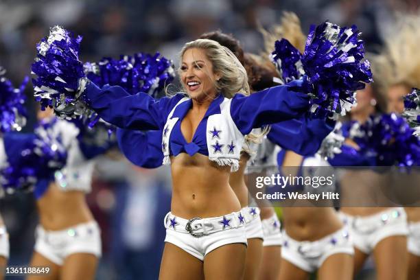 Dallas Cowboys Cheerleader performs during the game between the Washington Football Team and Dallas Cowboys at AT&T Stadium on December 26, 2021 in...