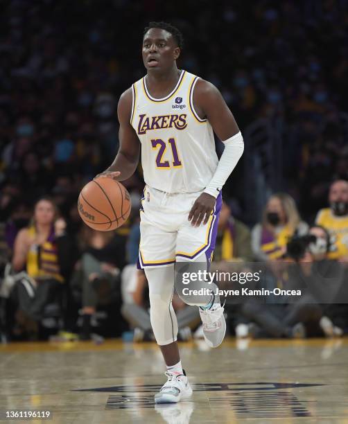 Darren Collison of the Los Angeles Lakers takes the ball down court during the game against the Brooklyn Nets at Crypto.com Arena on December 25,...