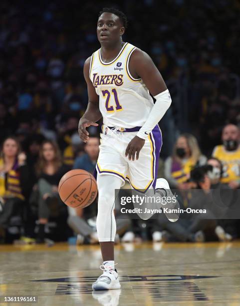 Darren Collison of the Los Angeles Lakers takes the ball down court during the game against the Brooklyn Nets at Crypto.com Arena on December 25,...