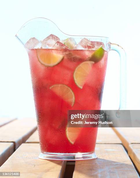 cranberry pitcher drink - cranberry juice stock pictures, royalty-free photos & images