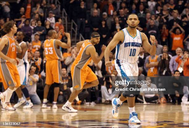 Eric Gordon of the New Orleans Hornets celebrates after scoring the game winning basket against the Phoenix Suns during the season openning NBA game...