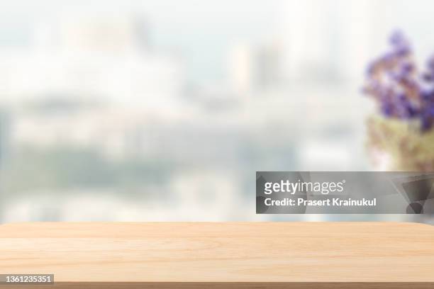 wood table top with white background. for montage product or text - white table top stock pictures, royalty-free photos & images