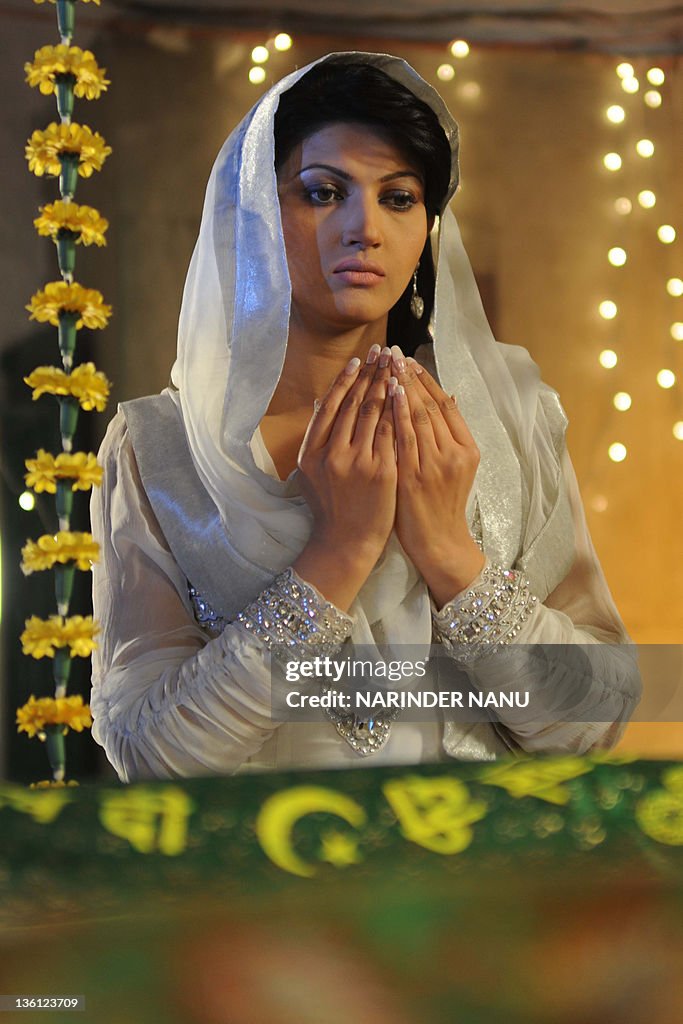Sana Raj Pakistani actress Sana pays her respects during a the making of a ...