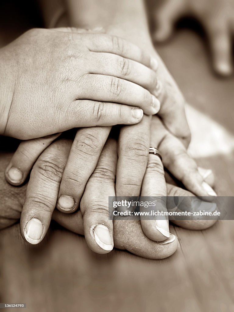 Hands on top of each other