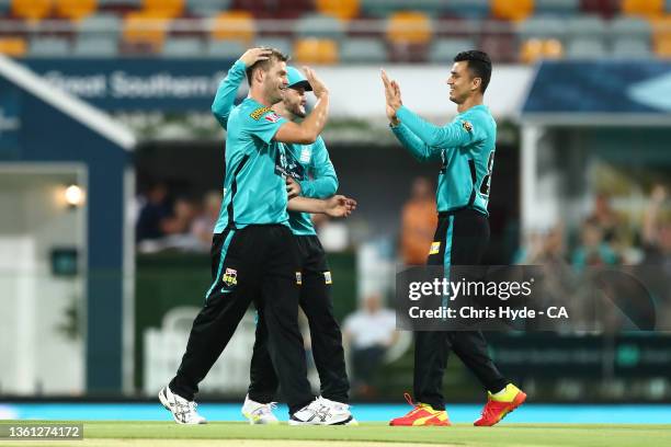 Mark Steketee of the Heat celebrates dismissing Glenn Maxwell from the Stars during the Men's Big Bash League match between the Brisbane Heat and the...