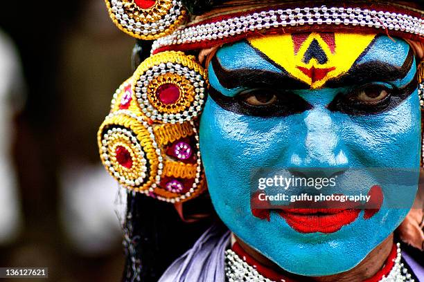 colorful face-mayilattam artist - cotchin stock-fotos und bilder