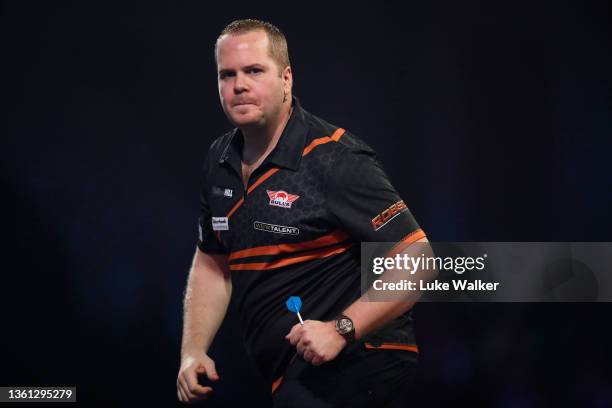 Dirk van Duijvenbode of Netherlands in action during his Round Three match against Ross Smith of England during Day Ten of the William Hill World...