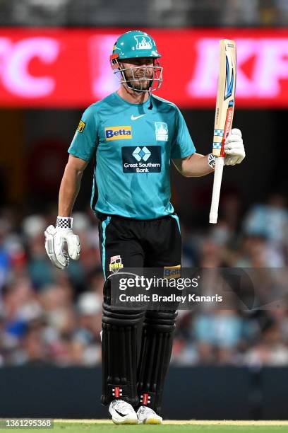 Chris Lynn of the Heat celebrates his half century during the Men's Big Bash League match between the Brisbane Heat and the Melbourne Stars at The...