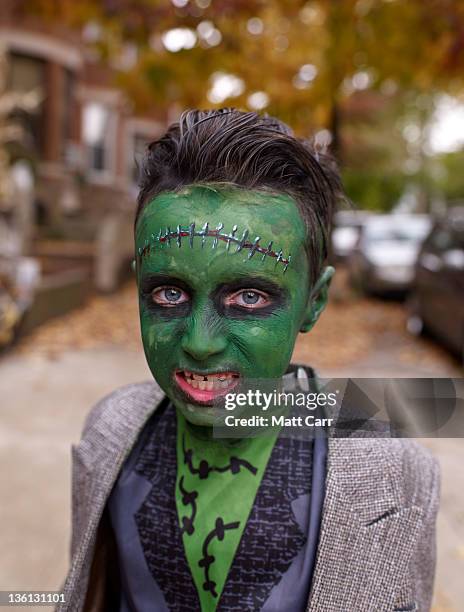 kid in halloween costume - nyc bodypainting day stock pictures, royalty-free photos & images