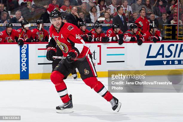 Chris Phillips of the Ottawa Senators skates during an NHL game against the Buffalo Sabres at Scotiabank Place on December 20, 2011 in Ottawa,...