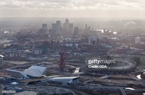 In this handout image provided by the Olympic Delivery Authority, an aerial view looking south reveals a view of the Olympic Stadium, the Aquatics...