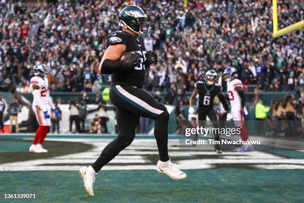 Lane Johnson of the Philadelphia Eagles scores a touchdown against the New York Giants at Lincoln Financial Field on December 26, 2021 in...